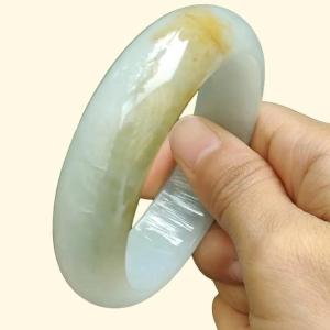 Beautiful Crafted as 59mm Peace Bangle with Light Green Hue Brownish Yellow Type-A Natural Jadeite-Jade certificate weighs 77.9 grams Width: 17.6 * Thickness 8 mm (bangle12)