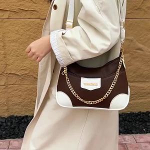 Color-block crescent chain bag a lightweight and luxurious PU leather shoulder bag with contrasting colors a retro-style small bag for women