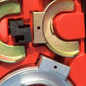 Damper spring compressor removal tool with  sleeve