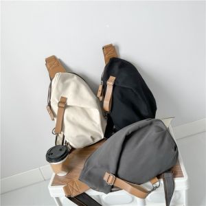 GESTURE ความจุขนาดใหญ่ กระเป๋าคาดหน้าอกผู้ชาย ผ้าสีพื้น ป้องกันน้ำ กระเป๋าสะพายขี่จักรยาน แฟชั่น หลายฟังก์ชัน กระเป๋าโทรศัพท์แบบสบาย หนุ่มๆ