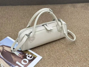 Genuine leather vintage sausage bag 2025 new niche design ins fashion Y2K high-quality cowhide womens simple long handbag
