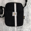 Carhartt Straddle Corduroy Vertical Crossbody Bag. 