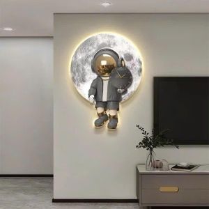 (ẢNH CHỤP) Tranh đồng hồ đèn led phi hành gia 4 uv mặt mica sáng bóng kèm đinh
