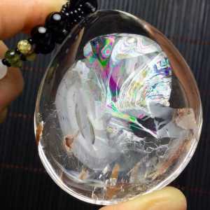 All-natural fully-enclosed multi-color gemstone pendant ✨💎 Pure white body exquisite craftsmanship hand-polished by pure hands. Purely natural formation natural gemstone flowers inside the crystal form multi-colors with a full shape.