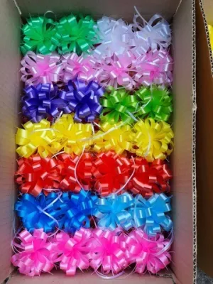 ดอกไม้ริบบิ้นติดของขวัญ 84 ดอก ราคา 240 บาทริบบิ้นติดของขวัญ ติดเครื่องสังฆภัณฑ์ ของชำร่วย ลาย ดอกตระกร้อเบอร์2ดึงเส็รจ