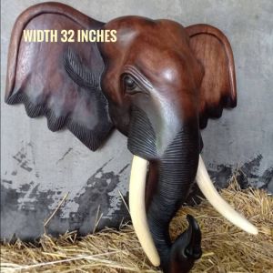 หัวช้างแกะสลัก หัวช้างติดผนัง ช้างมงคล ช้างไม้แกะสลัก ไม้จามจุรีแกะสลัก งานแฮนด์เมดโดยช่างฝีมือ สวยงามปราณีตมาก ของประดับตกแต่งบ้าน ร้านค้า