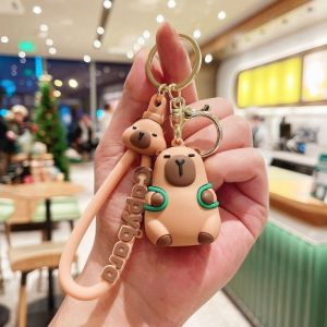 Creative Cute Capybara Keychain Cute Animal Porpoise Hugging Turtle Doll Car Key Pendant Anime Accessories Birthday Gift for Boys and Girls