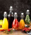 Chai thủy tinh Giara tròn bầu nắp gài 500ml 1000ml. 