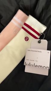New lulu Embroidered knee-high athletic socks with a towel-like texture featuring two stripes long tube design suitable for yoga fitness and training