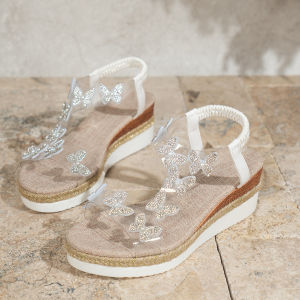 The New European and American Style Platform Bottom Round Toe Butterfly Transparent One-line Womens Large Size Wedge Sandals