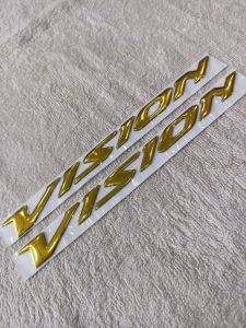 Bộ tem nổi dẻo cặp 2 chữ dán xe máy Honda Vision màu vàng zin thái siêu đẹp