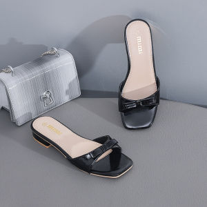 Lz07- Mimi Black patent leather slide sandals with bow detail and square toe.