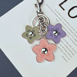 ตัวยึดกุญเเจแฟชั่นสายโทรศัพท์มือถือพวงกุญแจรถประดับกระเป๋าพวงกุญแจลายดอกไม้สำหรับกระเป๋าสตรีที่อ่อนเยาว์