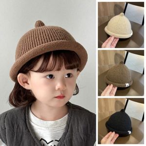 SWEET TIM หมวกกันหนาว ฤดูหนาวฤดูใบไม้ร่วงฤดูหนาว หมวกขอบโค้ง เกาหลีแบบเกาหลี สีทึบทึบ หมวกแก็นหมวกเด็ก น่ารักมากๆ นุ่มอบอุ่น หมวกถักสำหรับเด็ก เด็กชายเด็กหญิง