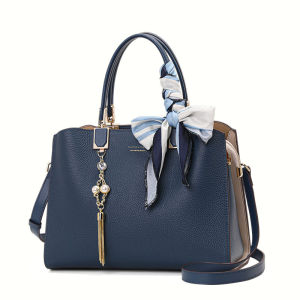 Aidrani Elegant and minimalist womens handbag made of high-quality first layer cowhide with metal tassels and ribbons