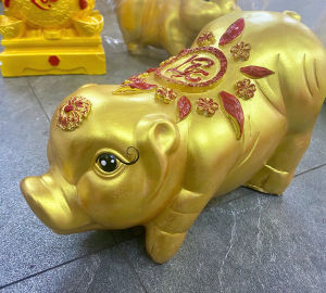 Heo tiết kiệm thạch cao heo mọi dáng Ngọc Trinh heo màu vàng tài lộc