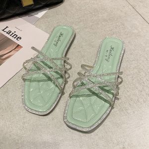 IELGY รองเท้าแตะผู้หญิงประดับพลอยเทียมรองเท้าวุ้นแฟชั่นพื้นเรียบแฟชั่นใหม่ฤดูร้อน