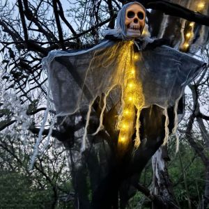 MKEB ตกแต่งด้วยการตกแต่ง ไฟผีหัวกะโหลกแบบแขวน ธีมสยองขวัญ ที่แขวนแขวน สายไฟกะโหลกผี ปาร์ตี้ฮาโลวีน แอลอีดี จี้กะโหลกศีรษะผี กิจกรรมกลางแจ้งกลางแจ้ง