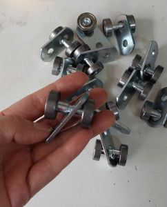 Bánh xe treo rèm kéo - Bánh xe dùng cho rèm trượt máng rèm nhà xưởng - Bi treo rèm kéo gara rửa xe