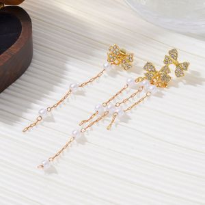 Fashionable Ring Gift s925银针时尚气质百搭耳饰轻奢高级感耳坠小众设计蝴蝶结流苏耳环