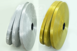 ริบบิ้นพับเหรียญ กากเพชร อัดลาย เบอร์ 2 (ม้วนใหญ่จัมโบ้)  เนื้อหนา ยาว 300 หลา