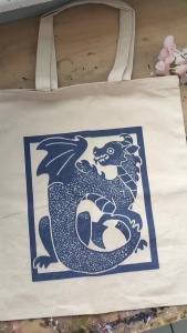 Cotton bag with a medieval dragon design: European-inspired design.