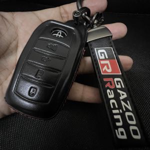 เคสหนังรีโมทรถ Toyota Fortuner Leader แบบ 4 ปุ่ม Fortuner GR Sport Legender 2022 งานหนังด้ายแดง (Leather Key Case Key) พร้อมพวงกุญแจคล้องหูกางเกงหัวโลหะหมุนได้ 360 องศา