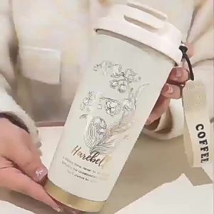 AU Gift 316 Stainless steel coffee cup stylish and luxurious with a ceramic inner lining insulated to keep drinks warm featuring a lily of the valley design