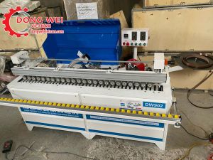 MÁY DÁN CẠNH 6CN HIỆU DW902 CẮT ĐẦU CUỐI TỰ ĐỘNG