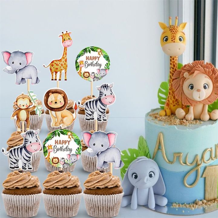 the sweet' 'art - A cute lil wild animals themed cake for a first birthday  celebration Flavour : Cake : Chocolate pound cake Filling : Chocolate  Mousse Frosting :White Chocolate Ganache Homemade