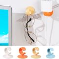 DOUBLEL Nail-free Plug Hook Non-marking Wall Adhesive Plug Storage Holder Multifunctional Plastic Power Plug Holder for Home. 