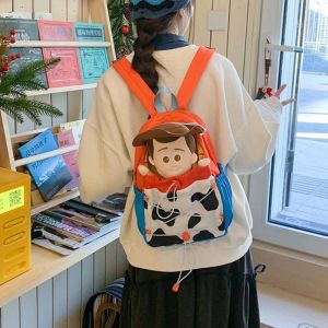 CHARMST จี้ กระเป๋าเป้สะพายหลังอนิเมะ Woody สายรัด การ์ตูน กระเป๋านักเรียนตุ๊กตาขนนุ่ม ความจุขนาดใหญ่ น้ำหนักเบา กระเป๋าสะพายคู่สีน้ำตาล ผู้หญิง