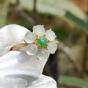 Very beautiful six Icy cabochon with good translucency Natural Type A Jadeite setting on G18k gold with 1 green cabochon forming a flower design ring and diamonds certificate included weigh 2.68 grams finger size 16.5mmdetails on description (18kring3)
