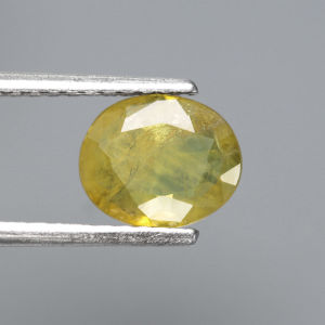 1.05 ct พลอยแท้ พลอยบุษราคัม เผาเก่า สีเหลือง ทรงไข่ บางกะจะ