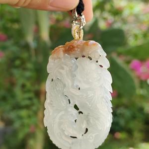 Carved with lizard bat peanut coin and ruyi Natural Type A Jadeite Pendant with NGI Gemstone report weight 136.84 grams 57.10 * 34.08 * 10.68 mm Translucent near colorless with reddish brown patch another good collection for collector (pendant132)
