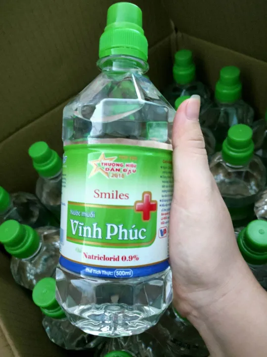 Nước muối Vĩnh Phúc 500ml & 1000ml -Nước muối sinh lý Dùng súc miệng , rửa mũi , vệ sinh vết thương - Mẫu nắp mới