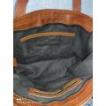 Tas map kulit asli model hobo handmade anyaman jogja. 