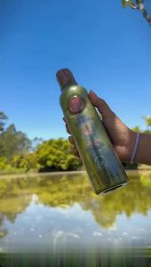 Ritual Botanico Intensive Natural Treatment Plex với chuối bơ và argan không chứa dimethicone hoặc silicon 400 ml màu xanh lá.