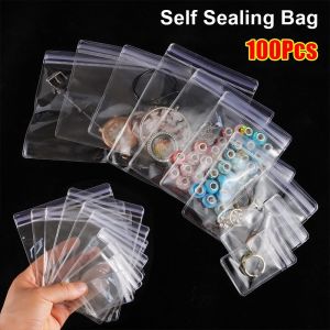 X CRAFT HOME 100Pcs PVC Plastic Self Sealing Bag Dustproof Transparent Jewelry Bag Durable Reclosable Zip Lock Bags Gift Packaging Storage Pouches