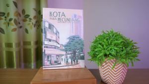 Buku Novel Kota Para Pecundang – Akad